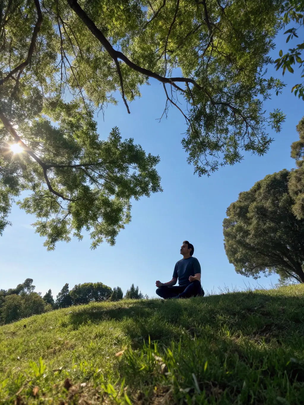 An individual reflecting in a peaceful setting, visualizing their goals and aspirations, representing personal growth and self-discovery through CatalystUK's coaching.